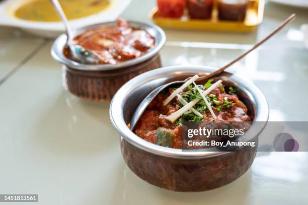 close up of chicken tikka masala served on table. - chicken tikka stock-fotos und bilder