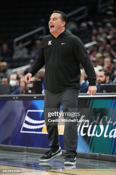 Head coach Sean Miller of the Xavier Musketeers looks on during a college basketball game against the Georgetown Hoyas at Capital One Arena on...