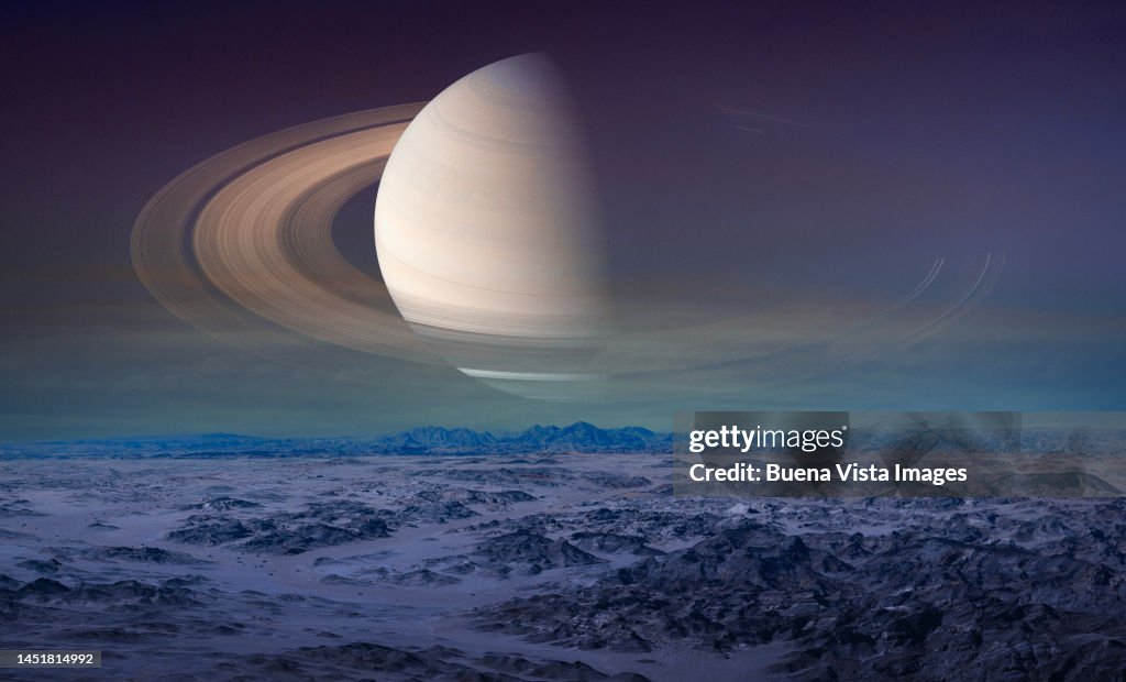 Planet Saturnt over a desert