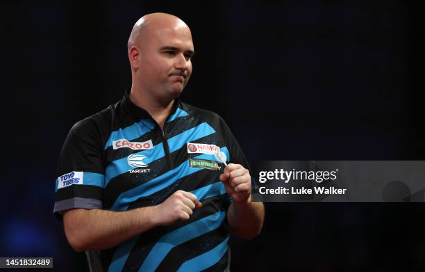 Rob Cross of England celebrates the win2 during his Second Round Match against Scott Williams of England during Day Nine of The Cazoo World Darts...