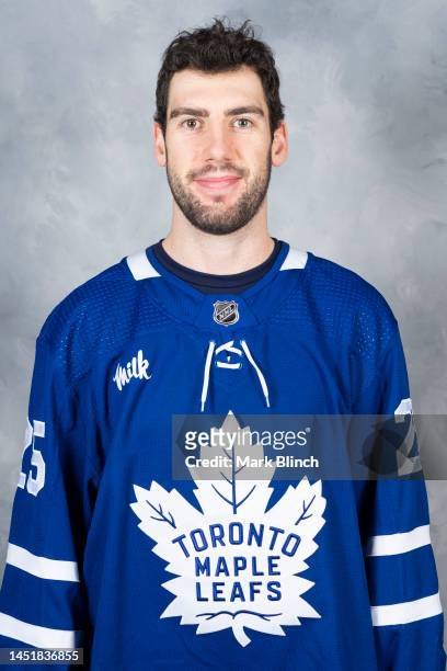 Conor Timmins of the Toronto Maple Leafs poses for his official headshot for the 2022-2023 season on December 22, 2022 at the Scotiabank Arena in...