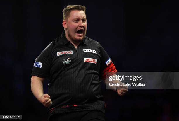 Martin Schindler of Germany celebrates the win during his Second Round Match against Martin Lukeman of England during Day Nine of The Cazoo World...