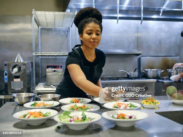working in a commercial kitchen - restaurant work stock pictures, royalty-free photos & images