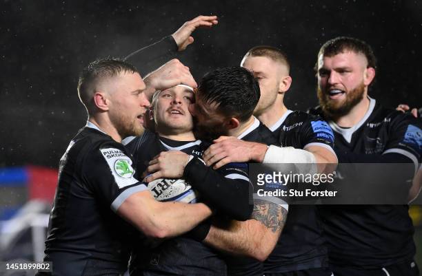 Falcons wing Mateo Carreras is kissed by Gary Graham as he celebrates with team mates after scoring the first try during the Gallagher Premiership...