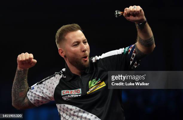 Danny Noppert of Netherlands celebrates the win during his Second Round Match against David Cameron of Canada during Day Nine of The Cazoo World...