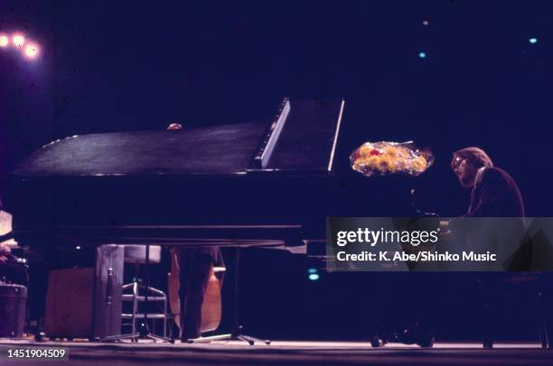 Bill Evans plays the piano in his trio, Shinjuku Kosei Nenkin Hall, Tokyo, Japan, 23 January 1976.