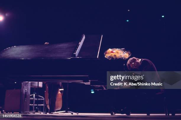 Bill Evans plays the piano in his trio, Shinjuku Kosei Nenkin Hall, Tokyo, Japan, 23 January 1976.