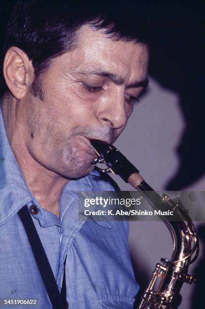 Art Pepper plays the alto sax,in blue shirt, close up, unknown, circa 1970s.