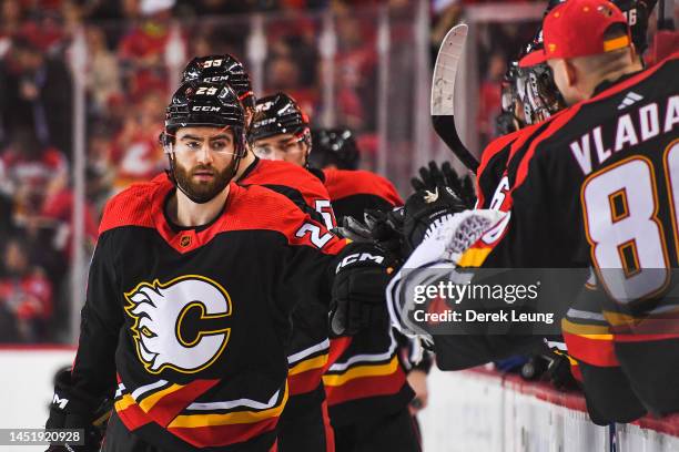 Dillon Dube of the Calgary Flames in action against the Vancouver Canucks during an NHL game at Scotiabank Saddledome on December 14, 2022 in...