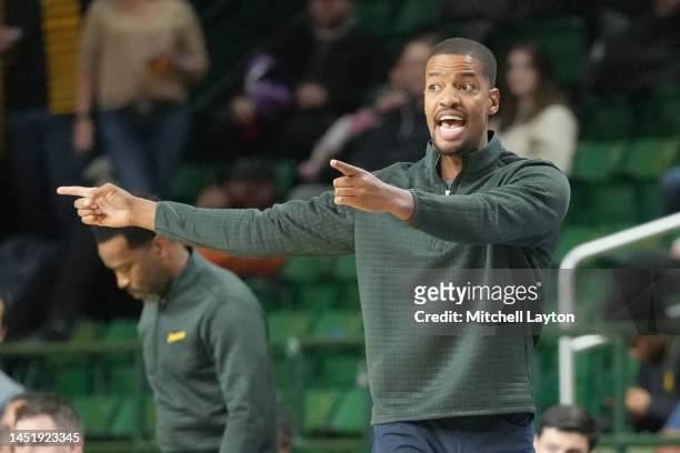 Head coach Kim English of the George Mason Patriots reacts to a call in the second half during a college basketball game against the Coppin State...