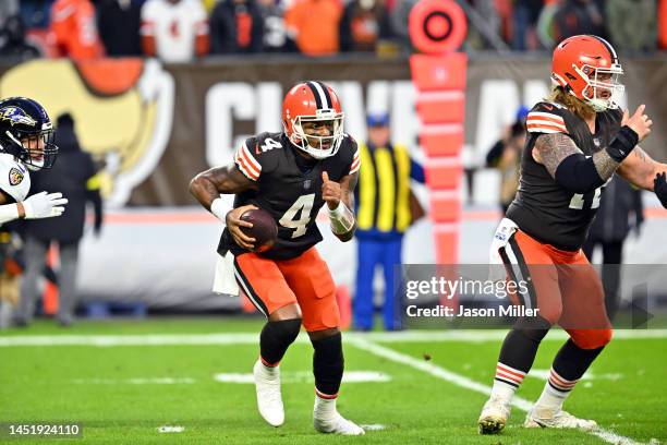 Quarterback Deshaun Watson of the Cleveland Browns runs during the first half against the Baltimore Ravens at FirstEnergy Stadium on December 17,...