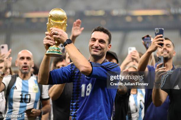 Lionel Scaloni coach of Argentina celebrates with the World Cup following the FIFA World Cup Qatar 2022 Final match between Argentina and France at...