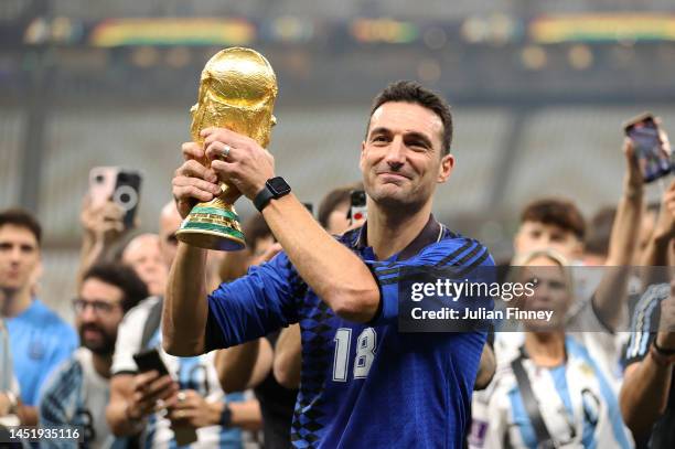 Lionel Scaloni coach of Argentina celebrates with the World Cup following the FIFA World Cup Qatar 2022 Final match between Argentina and France at...