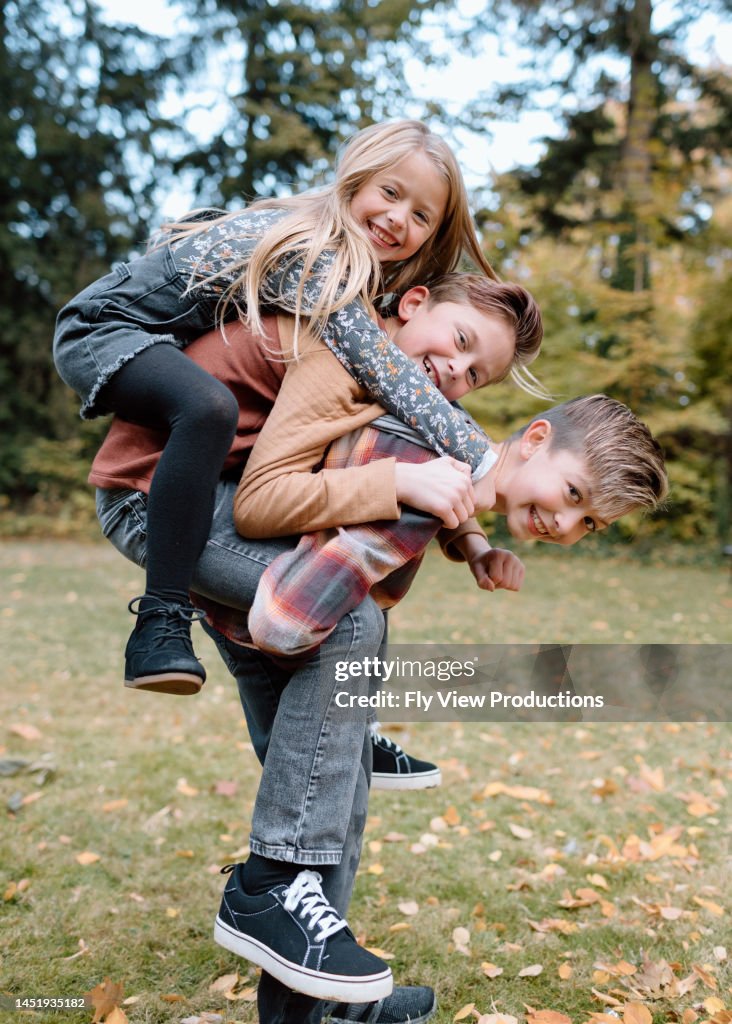 Isbling Fun Playful Siblings Having Fun Outside High-Res Stock Photo - Getty Images