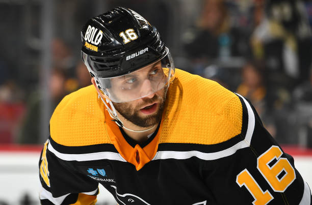 Jason Zucker of the Pittsburgh Penguins skates against the New York Rangers at PPG PAINTS Arena on December 20, 2022 in Pittsburgh, Pennsylvania.