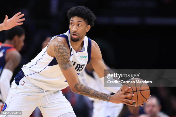 Christian Wood of the Dallas Mavericks controls the ball during the first half against the Houston Rockets at Toyota Center on December 23, 2022 in...