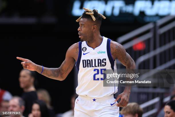 Reggie Bullock of the Dallas Mavericks reacts to a three point basket during the first half against the Houston Rockets at Toyota Center on December...