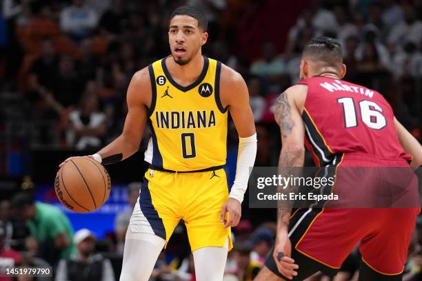 Tyrese Haliburton of the Indiana Pacers brings the basketball up court during the first half against the Miami Heat at FTX Arena on December 23, 2022...