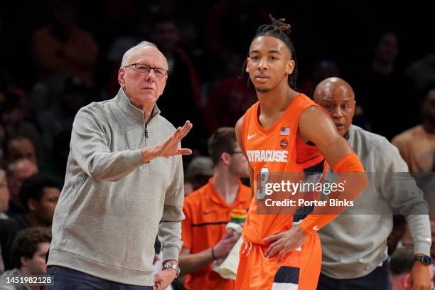 Head coach Jim Boeheim talks with Judah Mintz of the Syracuse Orange during the game against the St. John's Red Storm in the championship game of the...