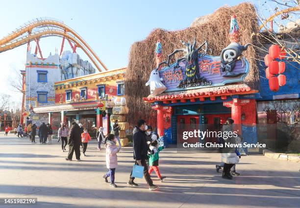 Tourists visit Happy Valley Beijing amusement park on the reopening day as the city eases COVID-19 control measures on December 23, 2022 in Beijing,...