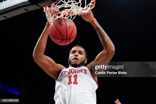 Joel Soriano of the St. John's Red Storm dunks the ball against the Syracuse Orange in the championship game of the Empire Classic at Barclays Center...