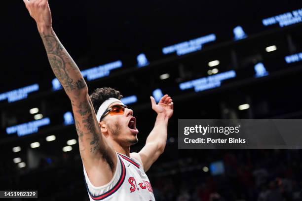 Andre Curbelo of the St. John's Red Storm celebrates after the win against the Syracuse Orange in the championship game of the Empire Classic at...