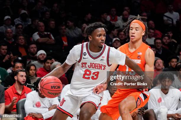 David Jones of the St. John's Red Storm dribbles the ball against the Syracuse Orange in the championship game of the Empire Classic at Barclays...
