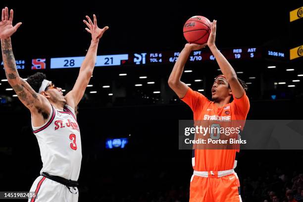Chris Bell of the Syracuse Orange shoots the ball against the St. John's Red Storm in the championship game of the Empire Classic at Barclays Center...