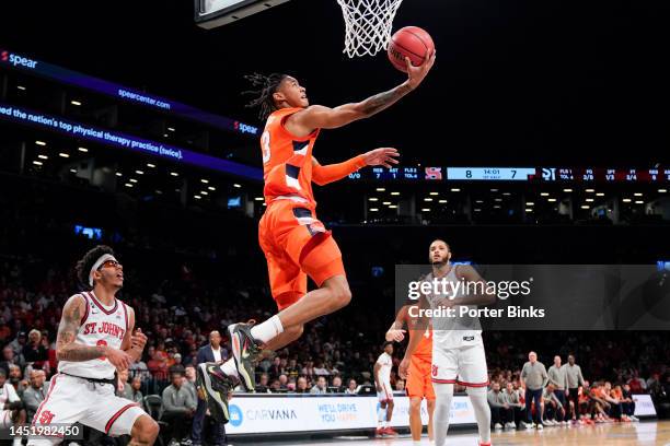 Judah Mintz of the Syracuse Orange shoots a layup against the St. John's Red Storm in the championship game of the Empire Classic at Barclays Center...