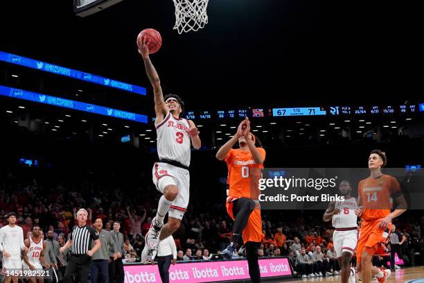 Andre Curbelo of the St. John's Red Storm shoots the ball against the Syracuse Orange in the championship game of the Empire Classic at Barclays...