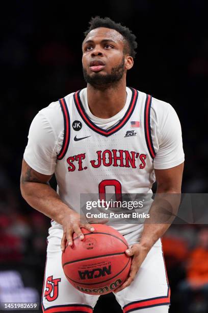 Posh Alexander of the St. John's Red Storm shots a free throw against the Syracuse Orange in the championship game of the Empire Classic at Barclays...