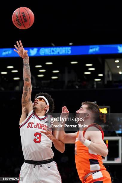 Andre Curbelo of the St. John's Red Storm shoots the ball against the Syracuse Orange in the championship game of the Empire Classic at Barclays...
