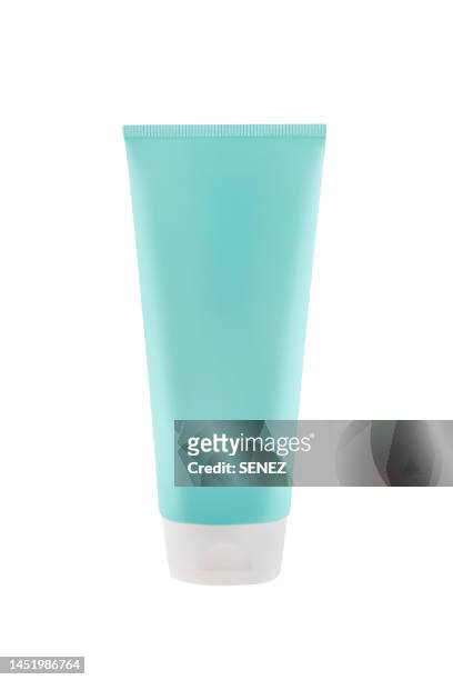 blue cosmetic bottle, isolated on white background - article de presse photos et images de collection