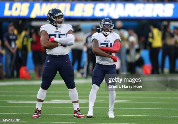 DeMarcus Walker of the Tennessee Titans celebrates his sack with Kevin Byard during a 17-14 loss to the Chargers at SoFi Stadium on December 18, 2022...