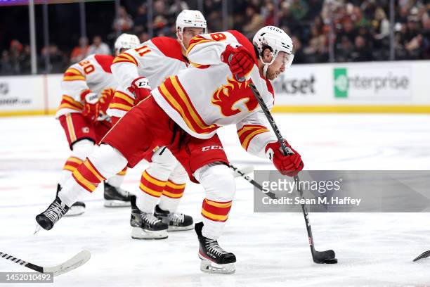 Andrew Mangiapane of the Calgary Flames shoots the puck during the first period of a game against the Anaheim Ducks at Honda Center on December 23,...