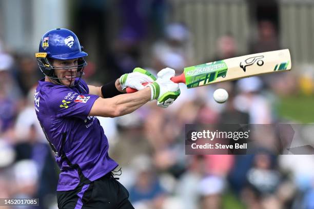 Tim Paine of the Hurricanes hits a boundary during the Men's Big Bash League match between the Hobart Hurricanes and the Melbourne Renegades at...