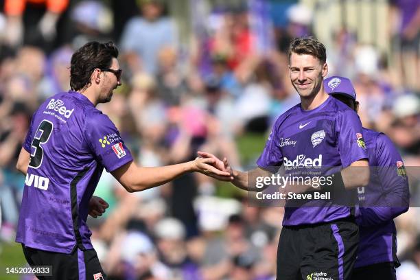 Riley Meredith of the Hurricanes celebrates the wicket of Sam Harper of the Renegades during the Men's Big Bash League match between the Hobart...