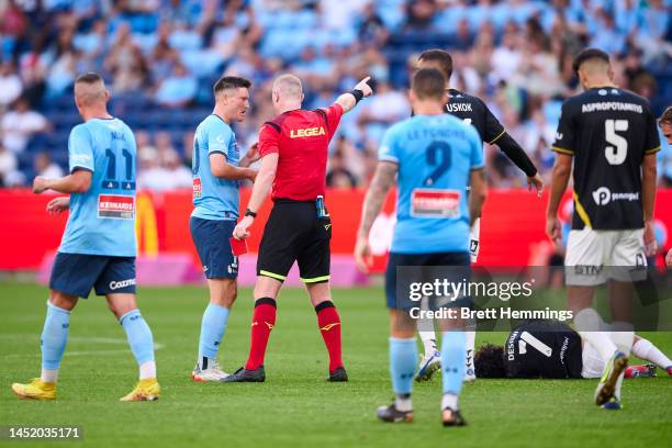 Joe Lolley of Sydney FC receives a red card for a tackle on Daniel DeSilva of Macarthur FC during the round nine A-League Men's match between Sydney...