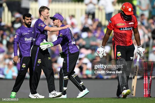 Riley Meredith of the Hurricanes celebrates the wicket of Andre Russell of the Renegades during the Men's Big Bash League match between the Hobart...