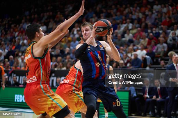 Jaime Pradilla of Valencia basket and Jan Vesely of FC Barcelona in action during the J15 Turkish Airlines Euro league match between Valencia Basket...