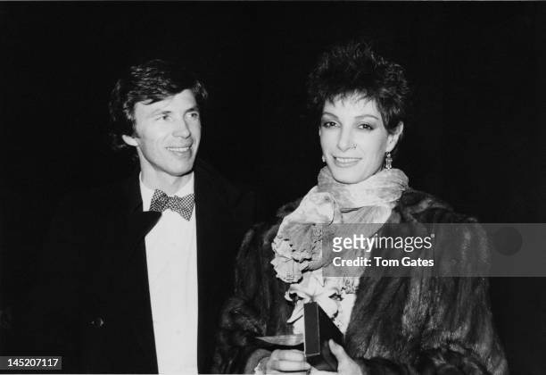American fashion designer Perry Ellis with Lynn Coleman at the gala opening night of the Metropolitan Museum of Art's Costume Institute exhibition,...