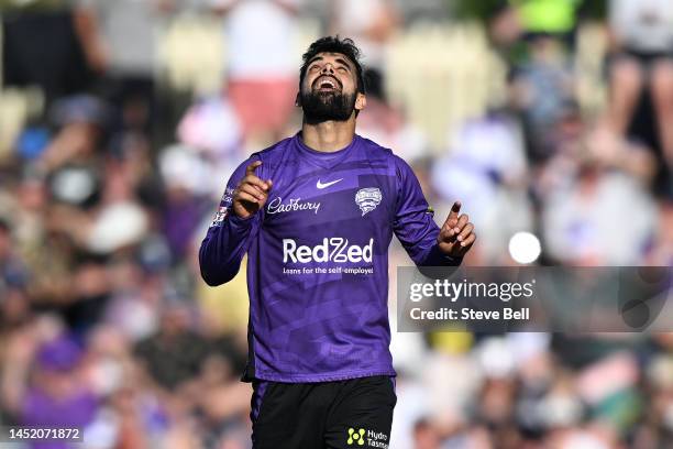 Shadab Khan of the Hurricanes celebrates the wicket of Jonathan Wells of the Renegades during the Men's Big Bash League match between the Hobart...