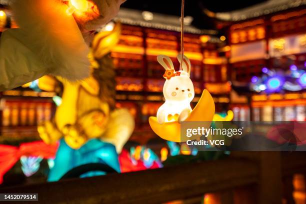 Tourists look at illuminated lanterns at the Yu Garden ahead of Chinese New Year, the Year of the Rabbit, on December 23, 2022 in Shanghai, China.