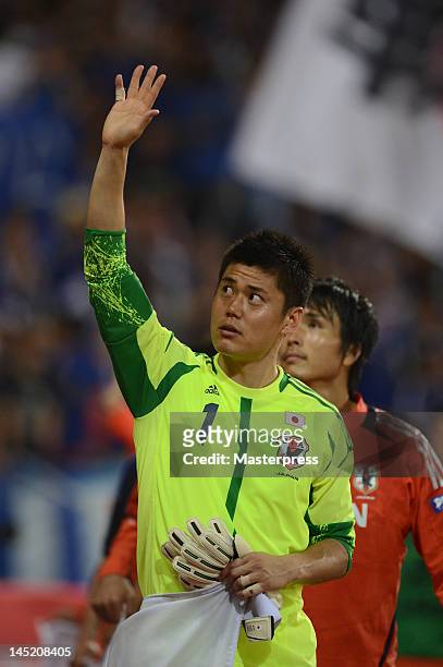 Eiji Kawashima of Japan waves to the fans during the international friendly match between Japan and Azerbaijan at Ecopa Stadium on May 23, 2012 in...