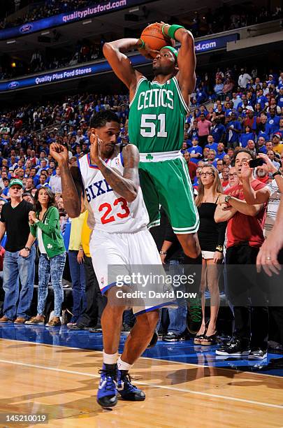 Keyon Dooling of the Boston Celtics takes a jump shot over Lou Williams of the Philadelphia 76ers in Game Six of the Eastern Conference Semifinals...