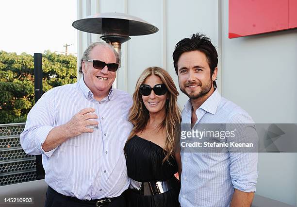 John Carrabino, producer Ellen Rakieten and actor Justin Chatwin attend an evening of cocktails and shopping to benefit the Children's Defense Fund...