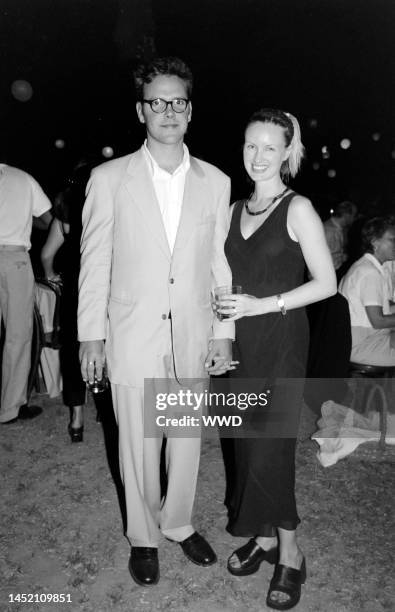 James Murdoch and Kathryn Hufschmid attend a party on Liberty Island in the Upper New York Bay on August 2, 1999.