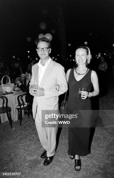 James Murdoch and Kathryn Hufschmid attend a party on Liberty Island in the Upper New York Bay on August 2, 1999.