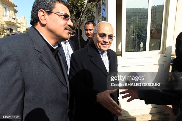 Ahmed Shafiq, the last prime minister to serve under Hosni Mubarak, arrives to register his candidacy for the presidential election in Cairo on March...