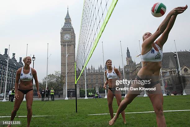 Members of Great Britain women's Beach Vollyball team Denise John, Zara Dempney and Shauna Mullin take part in a 'Stop Traffic' photocall on...